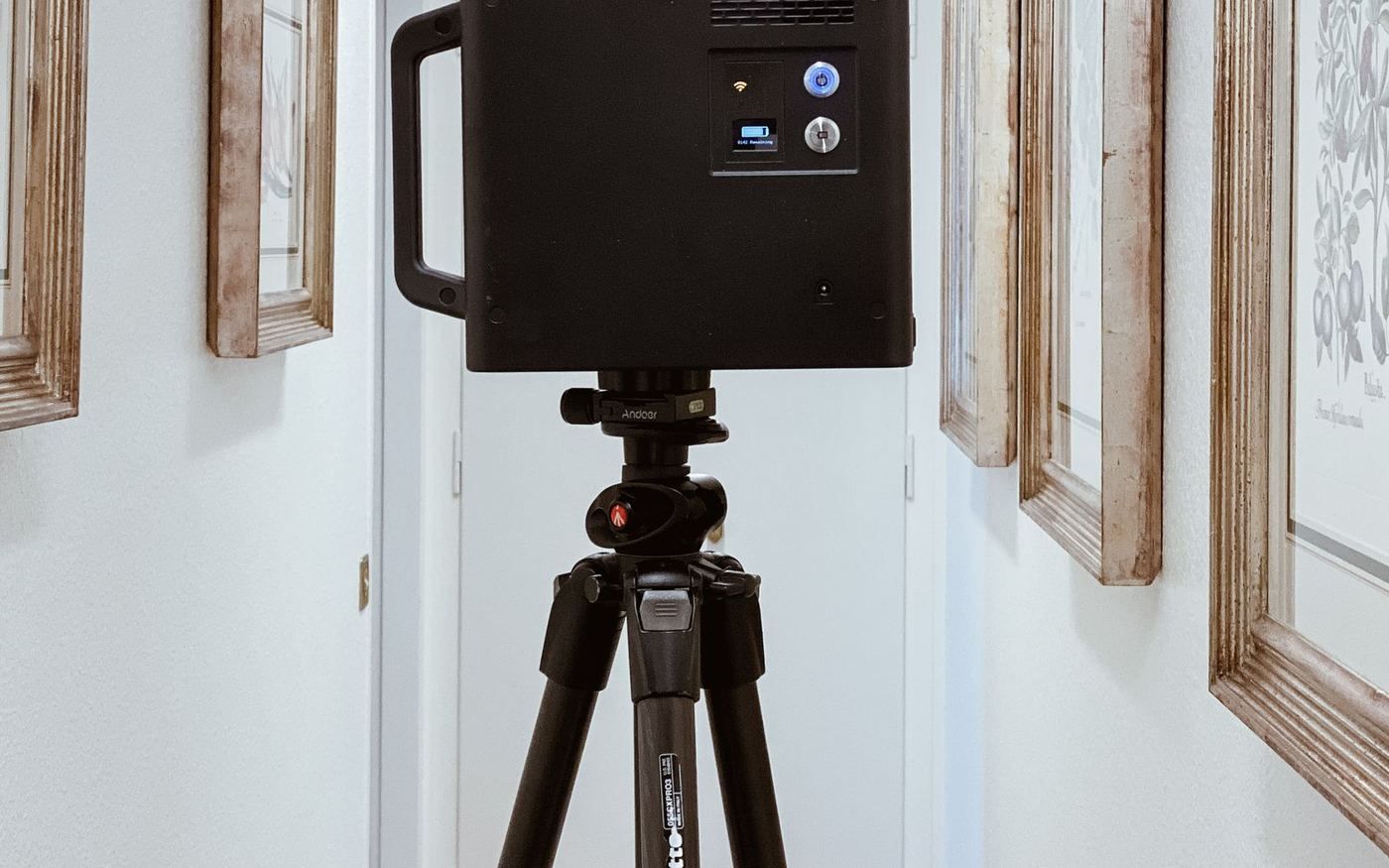 AIM United terrestrial laser scanner on a tripod in a Bank AlJazira headquarters corridor